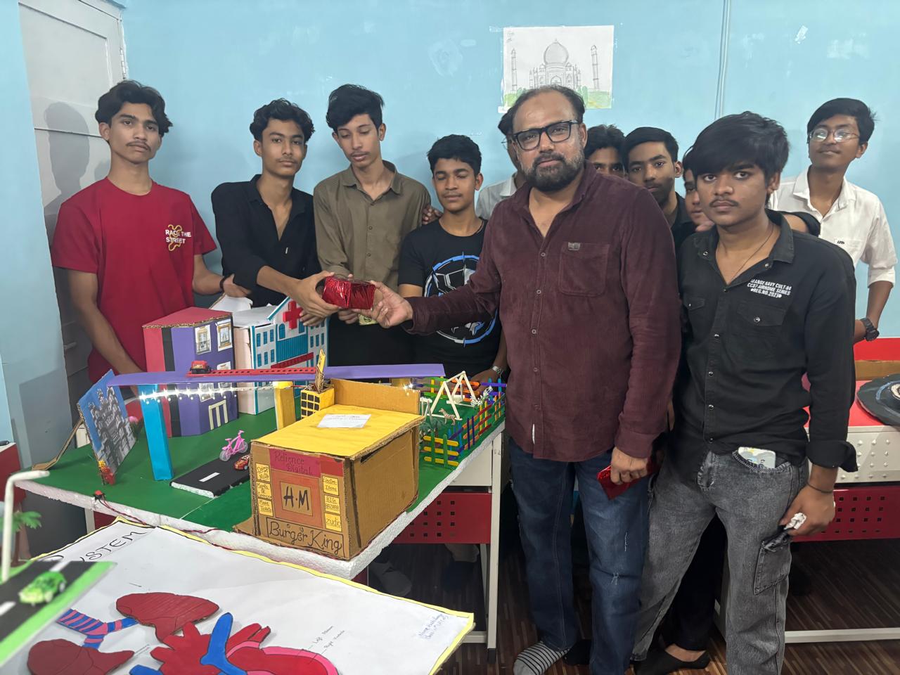 Students presenting models and projects at Saint Ann's School